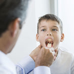 Tongue depressor with light